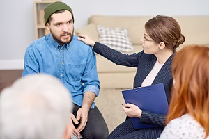 sad-participant-of-group-therapy-session